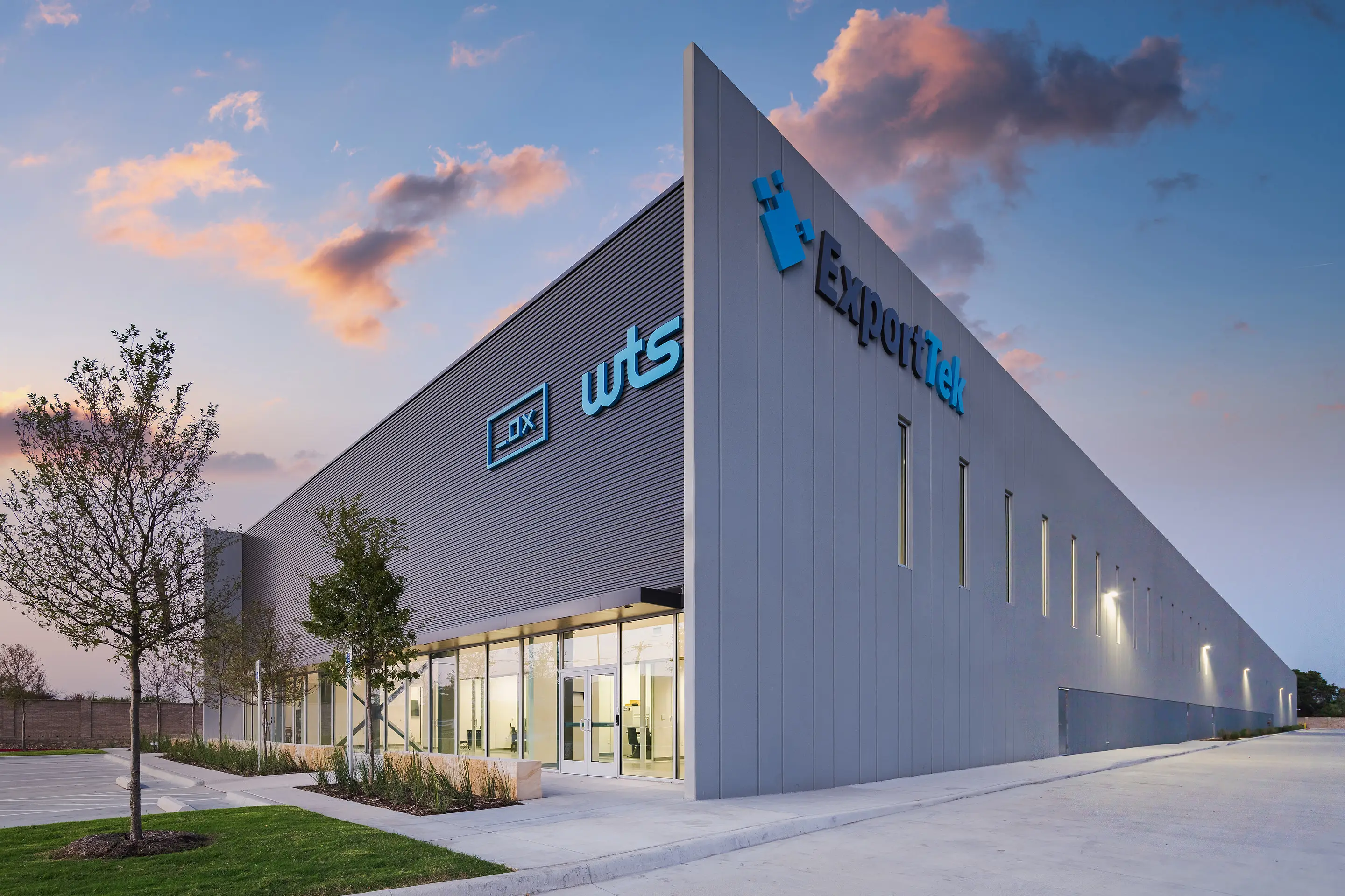 The angular corner of the WesternTechSystems facility at dusk